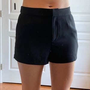 NWOT H&M Women's Black Pleat front elastic back shorts Sz 8